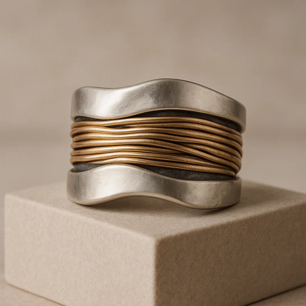 Silver ring with golden threads